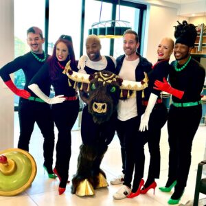 Jenni Thomasson Instagram - Horns, Hooves, Cape, Rose! It was such an incrediBULL experience getting to watch @todrick slay on #themaskedsinger all season and a nice surprise getting to add another version of Nails Hair Hips Heels to the repertoire for the Christmas special 😂! I’ll be spending this Christmas quarantining so I’m extra thankful we got to make some holiday magic while we could. I know so many are struggling right now and sick or in isolation. Sending lots of love to everyone and hoping for a healthier year ahead. #thankfultobevaxxed #letsgetboosted #wearamask ✌️
