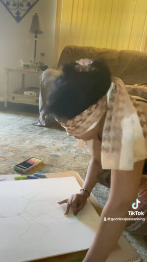 Jessica Franco Instagram - “Self portrait of meditation” 🪬Doesn’t it look exactly like me lol. 
Thank you for your inspiration @naja.art.collective 🙏🏽🧡
Make sure to give artist @naja.art.collective a follow and if you’re in the LA area. 
Hit up his art show “Scars In Charcoal” this weekend Saturday May 4th from 5-9 at the Ghost Gallery
Free entry