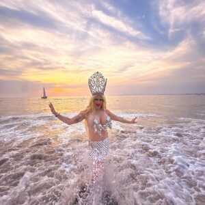 Jimbo Instagram - Just traded my voice for these legs with a Sea Witch in PV

Just Emerging from the ocean With my Crown after searching for Pearl Necklaces…Welcome to the stage Sandy Cracks

So much fun in the sun with @mrbradytaylor, thanks for all these pics my love.

#queen #beach #sunset #funset #vacay #crowning #beachy #waves #drag #beachbitch #sandycracks
