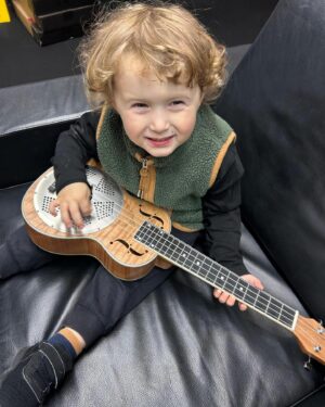 Jimmy Barnes Instagram - Went to the rock shop and got Teddy a resonator ukulele ready for rehearsal. He’s in the band now.  Sticky baked pork ribs for all my friends