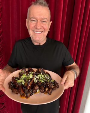 Jimmy Barnes Instagram - Went to the rock shop and got Teddy a resonator ukulele ready for rehearsal. He’s in the band now.  Sticky baked pork ribs for all my friends