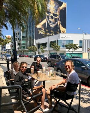 Joachim Rønning Instagram - I can’t describe what a kick it is to see our movie on the legendary Sunset wall! I remember when I started coming to LA twenty five years ago, having a meal at Mel’s Drive-In, looking up at that giant billboard and whatever event movie was staring down at me. And I remember it filling me with inspiration and ambition - hoping that maybe one day I would make a movie - and that it would tower over the lunch patrons at Mel’s. I want to thank @asadayaz and the entire marketing team at @disneystudios for continuing my Sunset dream. And thank you to all the servers over the years for taking our picture. You were sorely missed @hollyemblemronning and @ronningway 🏊‍♀️ YOUNG WOMAN AND THE SEA opens in theaters May31. Ticket link in bio 🏊‍♀️
