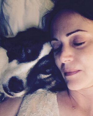 Joanna Going Instagram - Yesterday our sweet soulful beautiful crazy Maisie left this world, at home in my arms, gobbling chocolate kisses from my hand —true to herself to the end. 

She was a fiercely barking watchdog against anyone outside the window, but always ebulliently thrilled to see any person who walked through the door. 

She loved paper: paper towels, toilet paper, cardboard, books, magazines, instruction pamphlets, mail, something she found in somebody’s bag they left on the floor. Shredding it, eating it, leaving a trail of it all over the house and yard. 

She loved being chased and chasing balls. But never figured out to bring the ball back. 

She loved a good tug-of-war,
and ripping her stuffed toys apart. 

She loved FOOD AND TREATS AND FOOD AND TREATS AND FOOD AND TREATS. The girl could and would eat anything and would never stop trying to eat everything. 

She loved the camera and the camera loved her. 

She lived with two cancers in the last two and a half years, and still followed me room to room, everywhere I went, even when she could hardly pull herself up to wobbly walk. 

She was loyal. She was a comfort to me through tumultuous times. She made us laugh a lot. 

She loved us. And we loved her. 
Always. 

I am thinking of her somewhere beautiful, lounging with her sister Ruth, her husband Stitch, and her boyfriend Slicky, enjoying an endless buffet of all of the paper products she desires. 

Rest in Peace, Maisie, my love. 
2009 - 2023