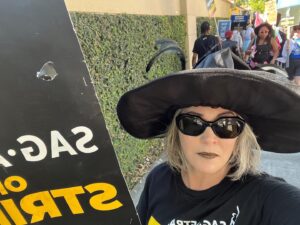 Joanna Going Instagram - Proud to be a SAG-AFTRA member since 1986. 
Proud to walk the SAG-AFTRA picket line. 
Proud to support our fierce Negotiating Committee. 
Proud of all  the members staying strong and fighting for a fair share. 

Actors work hard. Actors — from leads, to supporting players to background — contribute, on and off the set. The job begins long before “Roll camera” and ends long after “That’s a wrap”. 
Actors work hard at making audition tapes, researching roles, prepping to perform. 
Actors work hard at promoting film and tv projects with hours, days, weeks of press junkets, interviews, photo shoots, social media. 
Actors work hard for health insurance — and the majority of union members, who are paying their union dues, don’t make enough money to get union health insurance. 
I’ve been a working actor and union member for 37 years, and I don’t qualify for health insurance. 
Streaming is not “new media” anymore. It’s time to pay actors fairly for their work. 
Actors give their hearts and souls and passion guts to the work, and our worth is being threatened by soulless AI. 
Actors love what we do. 
We want to give you what we do. 
Actors— leads, supporting players, background — contribute and deserve a small piece of the billions that the studios make every year.
#SagAftraChallenge
#SAGAFTRAStrong
#SagAftraStrike
#Power2Performers