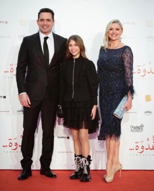 Joanne Farrell Instagram - So proud to be with my husband @dhaferlabidine and our lovely daughter Yasmine to celebrate the spectacular Tunisian Premiere of his award winning film @ghodwafilm at the Cité de la Culture, Tunis on Saturday night. What a fabulous evening! Congratulations to everyone involved. Thank you for the warm and wonderful reception 
🎬🥳💖🇹🇳

Loving my dress by @elizajanehowell
#elizajanehowell
@jessiecatculley

@ghodwafilm
#ghodwafilm
@dhaferlabidine
#dhaferlabidine
@DoubleAproductions
#DoubleAproductions