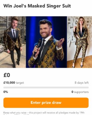 Joel Dommett Instagram - WIN THIS MASKED SINGER SUIT for £5! Help us raise some incredible money for @braintumoursupport by entering the raffle for this beautiful @joshuakanebespoke suit - plus a little personalised message. Tickets are £5 and it all goes to an amazing charity that supports families affected by brain tumours. Enter now - link is in my bio! It’s one of my favourites 🥰