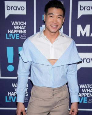 Joel Kim Booster Instagram - Receipts! Proof! Timelines! Screenshots! On WWHL with the Queen herself @heathergay! An absolute honor. Thank you @bravoandy for having me again. 

Styled by @marko_monroe 
Mug beat by @heidipakdel 
Shirt: @boyfriendshirt 
Pants: @alexanderwangny 
Shoes: @gucci