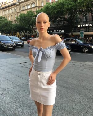 Joelle Instagram - It's International Alopecia Day!

I believe that people want to understand the unknown because we are naturally curious creations & wish to know more about what is beyond what we see, hear, touch & smell...beyond what we feel.

Ancient Egyptians had no hair because they removed it all & wigs & hair pieces were symbols of who you were in those ancient times. All the while the Romans thought it was vulgar. I have mentioned before about Maasai women in southern Kenya & northern Tanzania traditionally having very short hair, or no hair at all & that they are some of the most beautiful women in the world! 
Some people believe I'm ill & I understand why they might think this. I believe in education & understanding & whenever I meet someone who believes I'm ill, I explain that I am the same person with hair, as I am without.

Some people have told me they believe I shouldn't be happy because I have no hair, someone once said this after watching a multi-million $ advert on TV for a brand new hair enrichment product.

We are all passed messages, some of them are true & some of them are false. We must protect our freedom to speak so that we can eventually arrive at the truth about who told us what & why. Some messages are innocent, others are deliberately designed to disturb each other & divide us, many are created to bring us together.

My message for International Alopecia Day is simple & purely one for all to seek a better understanding of others.

Having no hair is beautiful, I don't just believe that, I know it because I live it. I also know that other people might think that I have to tell myself this to survive & I understand why they might want to believe this too.

I have met many people who are free to think what they want to think but all I ask of everyone today & all I wish for everyone, is to learn & understand why I believe what I believe & why I see what I see.

Whether you are ancient Egyptian or Roman in your appreciation of what hair is, understand & respect each other.
Joelle x
.
.
.
#alopecia #internationalalopeciaday #alopeciaawareness #joelle #summer #budapest
