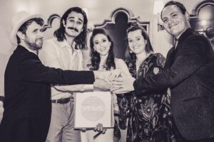 Joey Richter Instagram - 🚨WEDDING PHOTO DUMP PART 1 OF ???🚨

Our ceremony was a dream and we couldn't have done it without our beautiful friends! We are so grateful!

1) Ok this is actually us exiting the ceremony but it's a fun pic!

2) Dylan Darren and Jordan sang us down the aisle with truly the most BEAUTIFUL arrangement of You're Gonna Live Forever in Me 

3) Joey and I listening to them sing. I SOBBED all my makeup off in the first 2 mins of the wedding bc their voices were so beautiful. Spent the rest of the ceremony looking like Ozzy Osbourne. That is how life goes! 

4) A tight 5 to open the ceremony, as god intended

5) Nick was our officiant and it meant so much to us! He is one of our dearest friends 🥹 Plus he killed it! 

6) Joey and I each picked a friend to give a lil speech! Joe was Joey's pick, he did an amazing job AND managed to work in GG and Lost.

7) Julia was my pick and she gave a beautiful speech and made us cry and feel reflective, per usual!

8) We laughed through the whole fuckin ceremony! I look terrifying when I laugh, but that is also life!

9) Exhibit B

10) Friends, legally bound. 

There will be more dumps, sorry gurlies!!!

All 📸 by @annielesser !
#worldsfirstwedding #wedding #clowns #love #gilmoregirls #OfficialJLoWedding