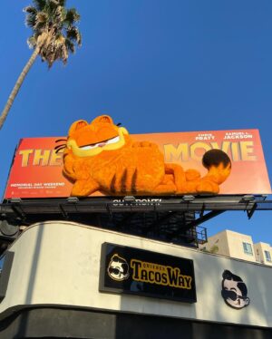 John Cohen Instagram - Amazing animatronic billboards, furry buses, benches, and orange all around town! 🧡 #GarfieldMovie