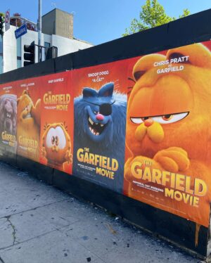 John Cohen Instagram - Amazing animatronic billboards, furry buses, benches, and orange all around town! 🧡 #GarfieldMovie