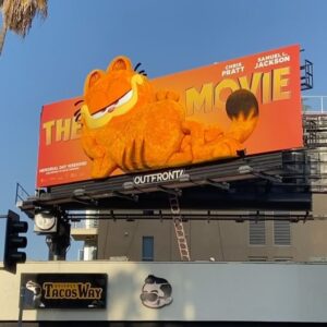 John Cohen Instagram - Amazing animatronic billboards, furry buses, benches, and orange all around town! 🧡 #GarfieldMovie