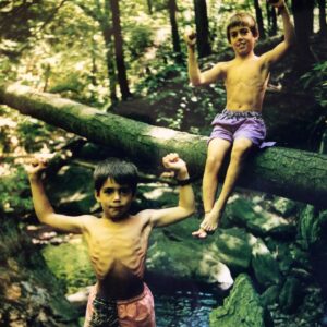 John DeLuca Instagram - He’s always known he was gonna be way stronger than me. I mean look at that flex. And then look at mine - has less effort ever been put into flexing for a photo? Doubt it. He’s been putting me to shame since day 1. 
.
Happy birthday, brother. We can whittle some more super cool walking sticks for a Cali Moto/hiking adventure soon. Keep being a freakin’ legend 👊🏼
.
.
Swipe ➡️ to see @daved311 get way more jacked then me 💪🏼😜

#tbt #glowup