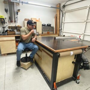 Jon Ecker Instagram - Startin’ the weekend off with a clean shop. Prolly won’t last past this cup of coffee. 

Miter station finished ✔️ 
Outfeed table ✔️ 
Dust collection ✔️
220v outlets ✔️
4 new 120v circuits✔️
Lights hung✔️