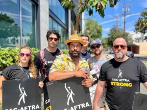 Jon Huertas Instagram - C’mon #amptp it’s friggin hot out here! Come back to these negotiating tables! Stop acting’ like that kid who came to playground with their ball, but got mad so they stormed off, WITH THE DAMN BALL, crying…we’re still out her wanting to play!!! #sagaftra #strong #wgastrong #sagaftrastrike big shout to my brothers & sisters @sullivangrams @timchiou gaellegillis @maryloubelli @haydenbone #lfg !!!