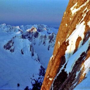 Jon Krakauer Instagram - On this date 45 years ago I took this selfie at my high camp on the Devils Thumb, striking a celebratory pose after surviving the sketchy descent from the summit without a rope. I was 23 years old. 2nd photo: Looking up at the Thumb from my basecamp before heading up to high camp. 3rd photo: My high camp on the Thumb. 4th photo: Looking across the southeast face at dawn as I departed high camp for the summit. 5th photo: A shot of the summit I took to prove I’d been there, looking east toward Mt. Burkett.