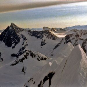 Jon Krakauer Instagram - On this date 45 years ago I took this selfie at my high camp on the Devils Thumb, striking a celebratory pose after surviving the sketchy descent from the summit without a rope. I was 23 years old. 2nd photo: Looking up at the Thumb from my basecamp before heading up to high camp. 3rd photo: My high camp on the Thumb. 4th photo: Looking across the southeast face at dawn as I departed high camp for the summit. 5th photo: A shot of the summit I took to prove I’d been there, looking east toward Mt. Burkett.