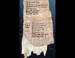Jon Krakauer Instagram - Happy Birthday Chris McCandless! He would be 56 years old. 1st photo: Chris cut his hair and shaved off his beard on July 3, 1992 in anticipation of his return to civilization. 2nd photo: The “to do” list he wrote on a strip of birch bark before leaving the bus. 3rd photo: Journal he wrote in the back of his book about edible plants. 4th photo: Grizzly bear skull he inscribed while living in the bus. 5th photo: Postcard he sent before heading into the wild. 6th photo: The bus flying out of the wild in June 2020. [Photos 1, 2, and 3 courtesy @carinemccandless. Photos 4 and 5 by me. Photo 6 courtesy Alaska National Guard.]
 
The bus has been restored to the way it was in 1992 and will be exhibited at the University of Alaska Museum of the North. Many of Chris’s possessions will also be exhibited. 
 
A fascinating article by Eva Holland—and a similarly fascinating podcast that includes commentary by Chris’ sister Carine—recount the long, strange saga of Bus 142 and explain how it ended up where Chris encountered it.  Hit link in my profile to read and listen.
