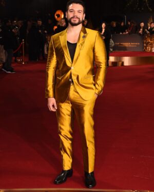 Josh Andrés Rivera Instagram - @thehungergames TBOSS London Premiere! Thank you for such a warm welcome to everyone involved, you were all such a blast. Cheers! 🇬🇧 

Fit: @dolcegabbana 
Styling: @mrenriquemelendez 
Glam: @larrykinghair 
Jewelry: @chopard 
📸 : @gettyimages 

#TheHungerGames #TheBalladofSongbirdsandSnakes #London #UK #WorldPremiere #BFI #DolceandGabbana #Chopard  #SejanusPlinth