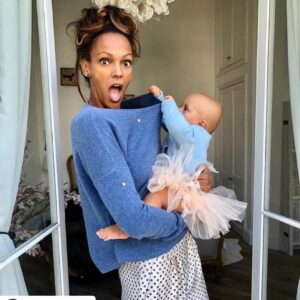 Judi Shekoni Instagram - Posted @withregram • @malin_darlin What is Lillie looking for under her mummy’s - actress @judishekoni #cashmerejumper- that's information we can't disclose BUT something we can tell is that like-mother-like-daughter matching outfit is fall most exciting trend...Treat yourself & and you little ones - boys too! - on www.malindarlin.com
.
.
.
.
#cashmere 
#minime 
#likemotherlikedaughter 
#momanddaughter 
#momanddaughtermatching 
#matchingmommy 
#babygirlfashion 
#kidsfashiontrends 
#kidsfashionlondon 
#kidsfashionweek 
#twilightedits 
#twilightsaga 
#twilightlove 
#maleficient 
#heroesreborn 
#5daysofvogue
#britishvoguebeauty 
#britishvoguebeautyawards2019