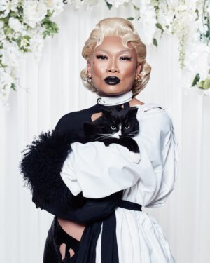 Jujubee Instagram - serving meow meow with @papermagazine 🐈‍⬛ 

Art Direction: @craighemming 
Model: @jujubeeonline 
 Photography: @kylegalvin_ 
Styling: @hollyblowslightly 
Production: @angelggbrown 
Hair: @rosskwan @aframe_agency (using Bumble   Bumble) 
Makeup: @louisehallmakeup (using Anastasia Beverly Hills)
 Set Design: @carolinamizrahi_studio 
Nails: @Lallan.y.a (using @opinailsuk) 
Flower Design: @yanskates 
Photography Assistant: @oliverfrancis 
Fashion Assistants: @frankieetyler and @adamatylda 
Hair Assistant: @hairby_connor
 Set Design Assistant: @livsnowden_design 
With Special Thanks to Katherine Delaney   Sya Groosman

Assistant: @lukepukes 

Link in Bio.