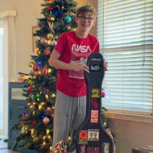 Julian Hilliard Instagram - Coolest Christmas present ever. My dad surprised me with his old bass from high school. Gonna be making all kinds of noise with this thing. 🎸 😎