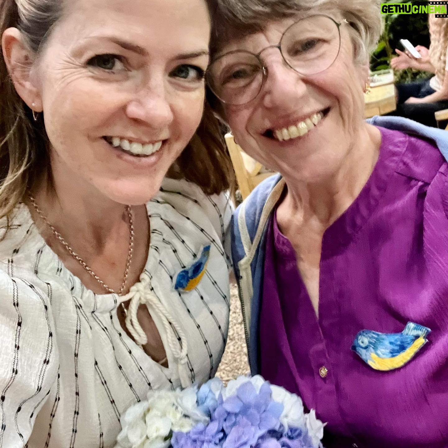 Juliana Dever - 457 Likes - What we do when we travel matters.
.
My guests and guide and I all wore our Ukrainian nightingale pins to dinner in Batumi, Georgia š¬šŖ. I noticed two women at the next table that frequently looked at our table, but I assumed it was because we broke into song ha!
.
As they got up to leave, one of the women approached our table and spoke to Natia (our guide).
.
She said she saw our pins. She and her daughter were from Kharkiv, Ukraine. She saw our pins and the support meant everything to them. Then she gave us the flowers she had brought for herself.
.
Batumi is a diverse town filled with so many different nationalities from Georgian to Belarusian to Ukrainian to Russian.
.
And some might say a gesture as small as a pin doesnāt really do anything, or itās performative, or not enough.
.
But in that moment, on that night, in that garden, 8 women speaking English, French, and Georgian meant everything to 2 women speaking Ukrainian. The languages didnāt matter, or that most of us couldnāt even understand each other. It was the subtle statement of a single pin that said that you are not alone in this world.
.
And it was a simple response of blue hydrangeas that said thank you, this is what I needed in this moment.
.
What you do when you travel matters šš
.
#cleverdevergeorgia22 #standwithukraine #nowar