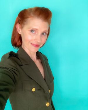Julie McNiven Instagram - Finally got to wear my Grandmother’s WWII nursing uniform and oh my, she was so tiny I could only manage one button and I could barely lift my arms! -So happy to have this piece of her story❤️