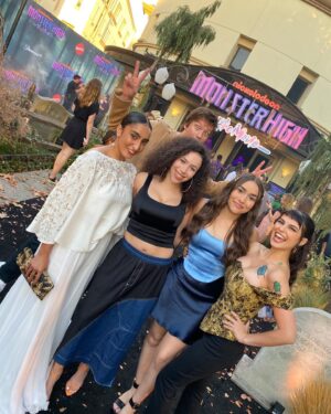 Jy Prishkulnik Instagram - Still screaming from this surreal evening at Paramount Studios with all my beast ghouls🪲💛 

Are you ready for Monster High: The Movie? It’s coming out of the dark in only 2 days☠️💗

PC: @peachhillmedia 

Now for some monster shoutouts: 

Thank you to the most incredible talent team for making my monster dreams come true @symingtontalentmanagement @throughthelooking.glass @characterstalentagency @cesdtalent @pedro_tapia___ @agentmelissabb 

Thank you to the wonderful  @sherylevine for giving this little girl a chance💜 

Thank you to the gruelest glam squad a mummy could wish for
Hair by @hairbaeraul 
Makeup by @makeup_by_jessicarobertson 
Custom corset by @aiko_kivamoto 

You made this vision come to life! 

Thank you for capturing these moments, carrying my Cleo bag, and for your loving care and support @iconicrickyy 

And always to my family for cheering me on from near and far💛🪲

#monsterhigh #monsterhighthemovie #paramountplus #cleodenile #beyourselfbeuniquebeamonster #newmovie #nickelodeon #moviepremiere #bts #mattelcreations #nickanimation