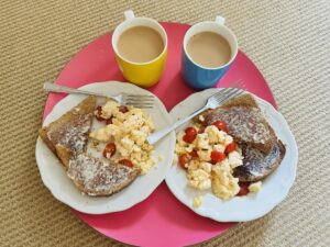 Kate Rusby Instagram - Had a rubbish, mega busy, sad, stressy week, felt so down and exhausted from it. 🙁😔
Our youngest daughter secretly set her alarm clock for 6am this morn so she could get up and make us breakfast in bed all by herself to cheer us up!! Awwww the beautiful souls like her in the world are what makes the sun shine. ☀️🌈❤️
And incidentally that’s what her name means! Phoebe-Phoebus- radiant sun. Thank you little one for the warm light. 🌸☀️❤️🙏