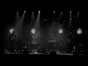 Kate Rusby Instagram - 🌸⭐️🌸 We had the most amazing, beautiful and heart warming gig last night at @thefromememorialtheatre. You sang your hearts out and gave us such a gorgeous welcome at your venue for our first ever visit. We can’t wait to come back 🙏🏻🌸⭐️🌸

On today to @lighthousepoole, vroom vroom 🚗

📸 1 by moi
📸’s 2&3 by our fab lighting engineer @zaknicholson 

#singysongysessiontour #springtour #frome #katerusby #guitars #acousticguitars #electricguitars #bass #rhodeskeys #moog #bouzouki #band #pooledorset @deebookane @duncanlyall @samkellysings @isophase_audio