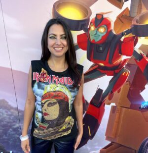 Kathreen Khavari Instagram - Thank you @hushi5 for making this beautiful IRAN Maiden shirt with her #زن_زندگی_آزادی (Woman, Life, Freedom) bandana. Transformers #earthspark comes out November 11 on @nickelodeon and @paramountplus, and I get to play a brand new Transformer robot named Twitch. 
Makeup by @harperartist 
Hair by @camilamariehair 
Tattoo by @east_01 
#مهسا_امینی