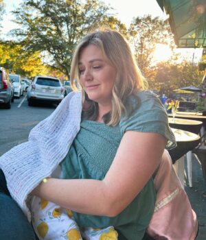 Katie Carpenter Instagram - We captured a smile! 😄 And also - I tried to breastfeed in public for the first time. Lots of ups and downs these days, but we wouldn’t trade it for anything. ❤️