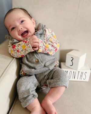 Katie Carpenter Instagram - 3 months. 💖

Time has sped up and slowed down all at once. Looking back at photos, you already look so different. You were a little stranger!

And now everyday, we get to know you even more. 

💛 You like to wake up from naps smiling. ☺️
💛 When you REALLY smile with a wide open mouth and shiny eyes, mom calls it ✨“sparkling.”✨
💛 You’ve gotten so many dog kisses from Ryder that you’re practically used to it. 🐾
💛 You love meeting new friends and any outside time. 🍃
💛 Blowing bubbles is your current favorite pastime, along with exploring your voice! 🫧
💛 You’ve gotten really good putting yourself to sleep for naps. 💤
💛 You’ve started to grabbing with those tiny little fists! 👶🏼
💛 Tummy time has gotten easier and you LOVE staring at the singing owl Nana Nancy gave you. 🦉

We’re so lucky to have our little angel baby. 💛