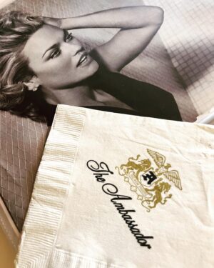 Kelly Carlson Instagram - I was lucky to have had the opportunity to shoot inside and outside of the Hollywood Ambassador Hotel. It was the very last shoot before they took her down. They gave me the napkins and a grand tour. It was such a cool hotel! I love history and old Hollywood and it was a time warp walking through the grand room, the lobby and all around. It was easy to channel the old Hollywood spirt. It’s all around you. I have it cemented into my life’s history. The last time this beauty stood in-front of a camera and I was fortunate enough to photobomb it. These are just a couple of the pics. 🖤#hollywoodambassadorhotel #hollywoodhistory #oldhollywood