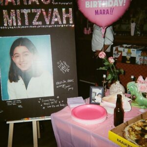 Kelly McCormack Instagram - The only pink I’d allow on here 🎀

Finally developed the photos from Mara’s Surprise Birthday Bat Mitzvah 🎀 

With the help of glorious glorious women, we gave a distinctly feminine tilt to the ritual. Thank you @jessejoy for the altar, @marissa.h.schwartz for the party dress & picture board, @jababeo for the tunes, and @blu.th for the words, ceremony, and Torah, and all the revelations and reinventions found within 🎀

And of course thank you to the Zigler family for your love & commitment 🎀

Mazel @ziglanation 🎀