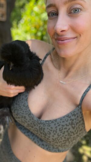 Kelsey Crane Instagram - My coop brings all the chicks to the yard 🐥 ⁣
⁣
Incorporated my @ecoversity Permaculture principles into this redesign with @joellehorowitz for my ladies as built by handyman magician Raul 🪄 🔨 We got a living roof with drainage, compost basket, hemp hay ground cover, pvc feeder tubes, automatic water feeder, non toxic paint by @portolapaints (🎨obey grey)…
⁣
Next up: rain barrels, clover buckwheat & alfalfa ground cover, and nasturtium vines for shade. And more spring chickens to join the coop!⁣
⁣
#Chickens #ChickenCoop #ChickenCoopDesign⁣ #silkie #silkiechicken #silkiechickensofinstagram