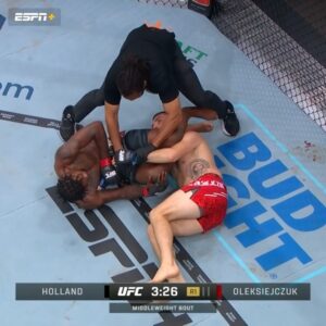 Kevin Holland Instagram - KEVIN HOLLAND WITH THE ARMBAR SUBMISSION IN ROUND 1 🔒 #UFC302