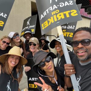 Kirsten Nelson Instagram - Thank you @dulehill for these photos. My found FRAMILY!! ❤️These picket lines are about solidarity and unity - and reuniting with past friends and making new ones with a shared creative passion. We have walked and marched and listened and held each other when things were great and cried on each other’s shoulders when things were low. Art creates connections for which the heart searches. And “just because we’re called to do it, doesn’t mean we shouldn’t get paid”. This is not easy, but this is strong. #sagaftrastrike #unionstrong💪