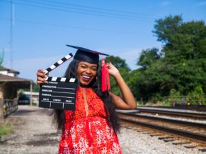 Kyanna Simone Simpson Instagram - B.A. in Entertainment and Media Studies w/ a minor in Spanish!🐶👩🏾‍🎓✨ How do I plan to use my degree? 🎬Filmmaking!🎬 I’ve been studying the ins and outs of various media industries for the last 4 years! Now, it’s time to apply it all to producing and directing film and television (along w/ my acting career of course!!)🎞🎞 This is only the beginning!!! 
•
📸: @senaiteshots 
YESSSS, SENAITE MURRAY BACK AT IT AGAIN W/ THE WHITE VANSSSS 🤪🔥@yungsenaite 
•
Hair slayed by: @tairon_salahuddin ✨👩🏾‍🎓
•
Face beat by.... MEEE🥰👩🏾‍🎓
•
#FUTUREFILMMAKER #UGAGRAD #GradyCollege #GoDawgs #DreamsDoComeTrue #IHopeYouDance