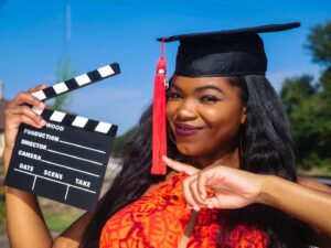 Kyanna Simone Simpson Instagram - B.A. in Entertainment and Media Studies w/ a minor in Spanish!🐶👩🏾‍🎓✨ How do I plan to use my degree? 🎬Filmmaking!🎬 I’ve been studying the ins and outs of various media industries for the last 4 years! Now, it’s time to apply it all to producing and directing film and television (along w/ my acting career of course!!)🎞🎞 This is only the beginning!!! 
•
📸: @senaiteshots 
YESSSS, SENAITE MURRAY BACK AT IT AGAIN W/ THE WHITE VANSSSS 🤪🔥@yungsenaite 
•
Hair slayed by: @tairon_salahuddin ✨👩🏾‍🎓
•
Face beat by.... MEEE🥰👩🏾‍🎓
•
#FUTUREFILMMAKER #UGAGRAD #GradyCollege #GoDawgs #DreamsDoComeTrue #IHopeYouDance