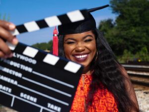Kyanna Simone Simpson Instagram - B.A. in Entertainment and Media Studies w/ a minor in Spanish!🐶👩🏾‍🎓✨ How do I plan to use my degree? 🎬Filmmaking!🎬 I’ve been studying the ins and outs of various media industries for the last 4 years! Now, it’s time to apply it all to producing and directing film and television (along w/ my acting career of course!!)🎞🎞 This is only the beginning!!! 
•
📸: @senaiteshots 
YESSSS, SENAITE MURRAY BACK AT IT AGAIN W/ THE WHITE VANSSSS 🤪🔥@yungsenaite 
•
Hair slayed by: @tairon_salahuddin ✨👩🏾‍🎓
•
Face beat by.... MEEE🥰👩🏾‍🎓
•
#FUTUREFILMMAKER #UGAGRAD #GradyCollege #GoDawgs #DreamsDoComeTrue #IHopeYouDance