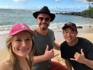 Kym Jackson Instagram - And theeen 6 months after we started dating - when your plans of proposing at burning man with a plastic electric glow ring @paultahoe and @brianaevigan found didn’t work out (I stole the ring from your bag because it was shiny and you couldn’t get reception to call my dad for permission) - you took me to Hawaii to “meet your parents”.

You proposed on the beach just after Sunset with a song you’d written the day before.. you remembered most of the words and made up the rest on the spot and it was absolutely perfect! 😻😻😻

My response was easy: “of course I will! Of course!!!”

#engaged #engagedlife #fuckyes #soulmates #bestfriends #storyofus #thestoryofus #hawaii #proposal #husbandmaterial #happiliyeverafter #kahala #kahalahotel #sheratonhawaii