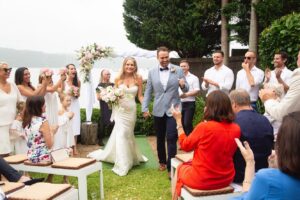 Kym Jackson Instagram - Next up… the wedding!!! 

The most perfect backyard wedding with so many of our favorite people.

I walked down the aisle with my Daddio (who got surgery just so he could walk that far) to the original recording of the song you wrote and proposed with. 

@brianaevigan @paultahoe and Natalie flew all the way from the Americas to be there! 

The prawns were life changing and so was the day. 

I always follow the rule that life should be f*ck yes or no and this was a resounding f*ck yes I absolutely want you by my side for the rest of my life.

Incredible 📸 by: @louisasetonphotography 

#married #storyofus #thestoryofus #backyardwedding #loveofmylife #happydays #husbandandwife #husbandface #weddingday #beachwedding #bestdayever