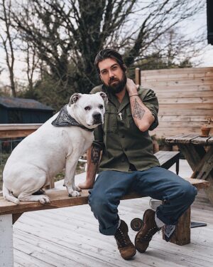 Lane Toran Instagram - Today’s project: build a bench from old barn wood. Hazy supervising per us(ual).