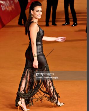 Lara Wolf Instagram - Thank you @romacinemafest for the red carpet invitation and world premiere of our film @theperformancefilm directed by our wonderful director @shira_piv ! And thanks to the amazing stylists that made me look decent 🖤💪🏽🌟 👗@jstyles.ny 💄@simonabravini.makeup 🎀 @angelonitania  #redcarpet #rome #premiere #cinema #film #tap #theperformance #singer #actress #indifilm #stylist #nyc #alejandraalonsorojas #tomford #revlon