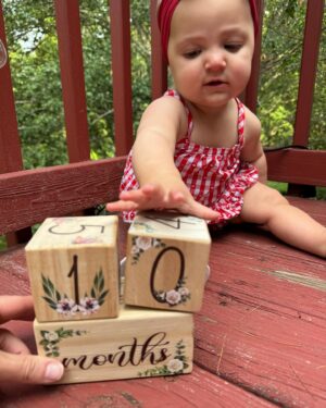 Larissa Wohl Instagram - 10 Months old and definitely not interested in “smiling for the camera” 📸 😂. Baby Emma is on the go these days. She loves trying new food, zipping around with her one-legged crawl and putting everything in her mouth! 
•
•
•
#mom #mama #momlife #mommy #momnashville #larissawohl #baby #babygirl #mybaby #mybabygirl #girlmom #daughterlove #daughter #emma #emmaelizabeth #workingmom #favoritejob #nashbabies #nashvillebaby #larissa #momhood #10months #10monthsold #tenmonthsold#larissawohl #stopgrowing #stoptime #lizziegirl