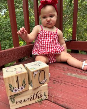 Larissa Wohl Instagram - 10 Months old and definitely not interested in “smiling for the camera” 📸 😂. Baby Emma is on the go these days. She loves trying new food, zipping around with her one-legged crawl and putting everything in her mouth! 
•
•
•
#mom #mama #momlife #mommy #momnashville #larissawohl #baby #babygirl #mybaby #mybabygirl #girlmom #daughterlove #daughter #emma #emmaelizabeth #workingmom #favoritejob #nashbabies #nashvillebaby #larissa #momhood #10months #10monthsold #tenmonthsold#larissawohl #stopgrowing #stoptime #lizziegirl