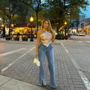 Larsa Pippen Instagram - Chi-town  Top: @retrofete bag: @balenciaga