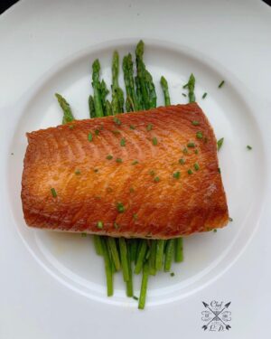 Lawrence Duran Instagram - Crisp seared salmon & roasted pencil asparagus 
#Dinner #Simple #Fun #Clean #Delicious #ChefLife #WahlbergChef #Family #Blessed